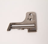 Needle plate with part model 205465-C